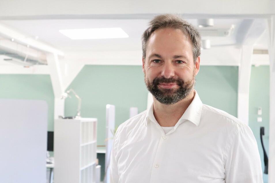 Porträt von Carsten Bether als Hintergrund für Kiwigrid Success Story